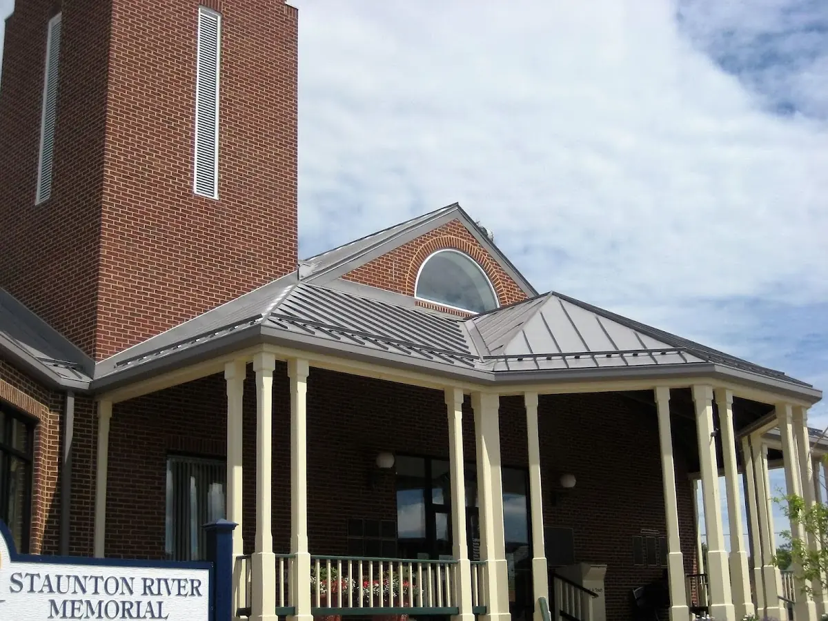 Skilled roofing craftsmen working on a residential roof in Germantown